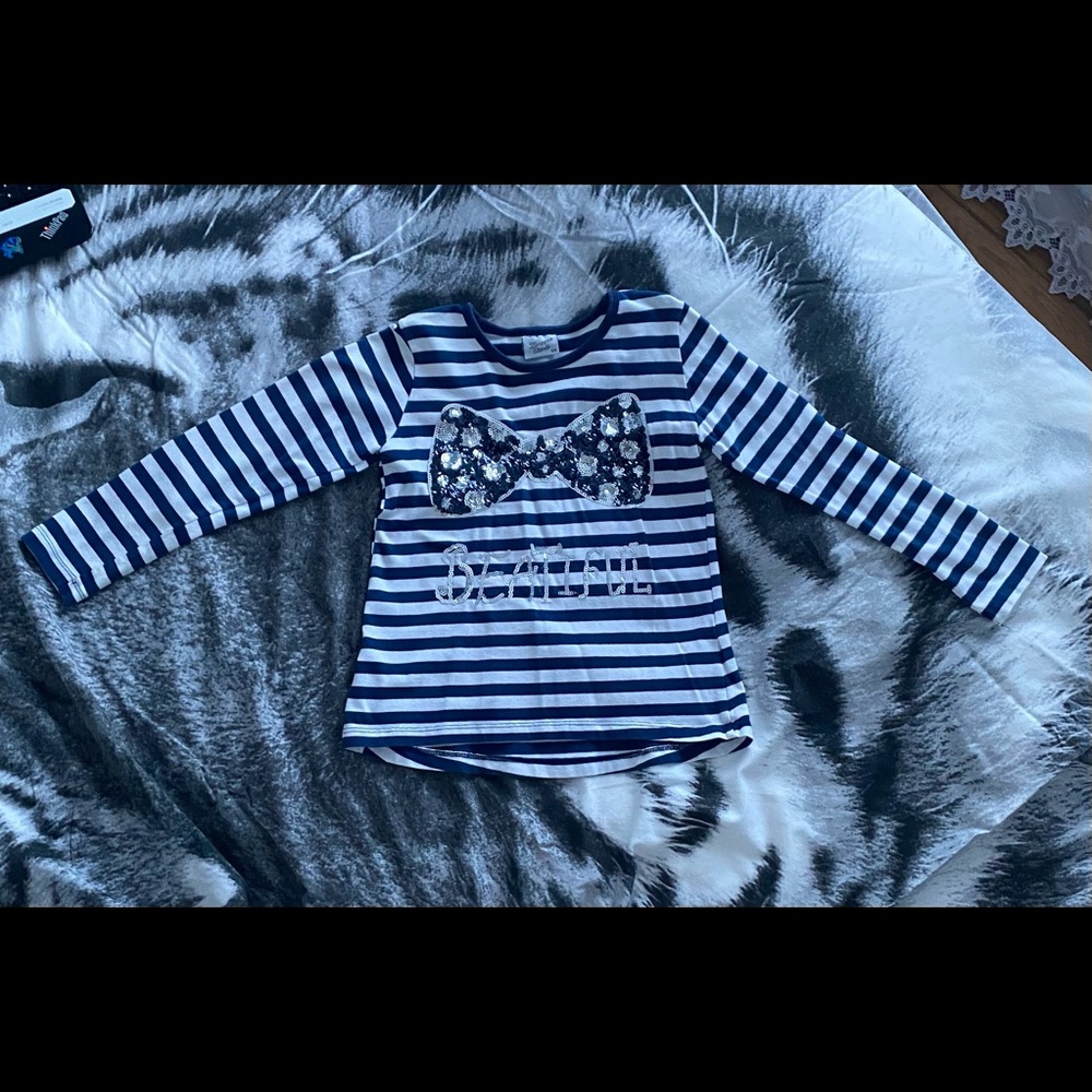 Blue and white striped shirt. Size 128.